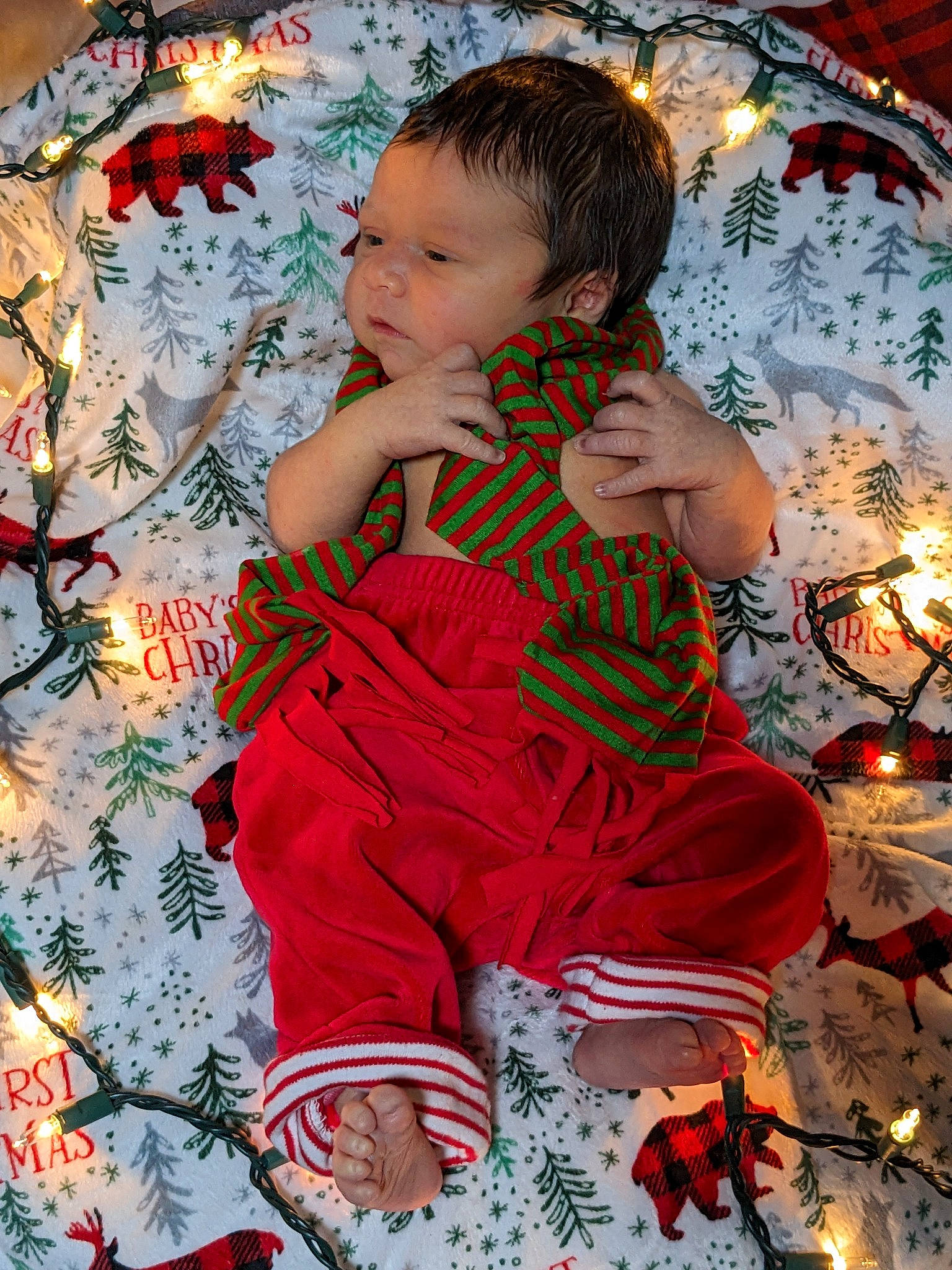 Jordan is registered to the contest to win money with this photo: baby, baby_toddler_clothing, child, christmas, christmas_decoration, christmas_eve, christmas_ornament, dress, event, happy, holiday, holiday_ornament, orange, ornament, pattern, people_in_nature, person, sleeve, toddler, tree