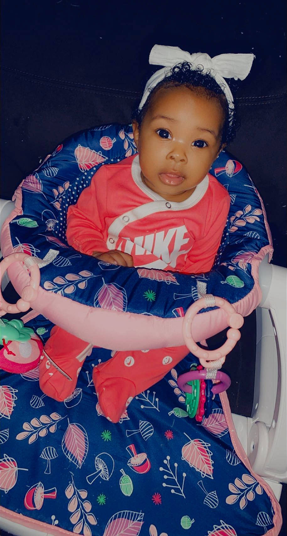 Ailani is registered to the contest to win money with this photo: baby_products, baby_toddler_clothing, beauty, child, cool, electric_blue, eye, face, fashion_accessory, flash_photography, fun, happy, head, headband, jewellery, pattern, person, pink, sitting, sleeve