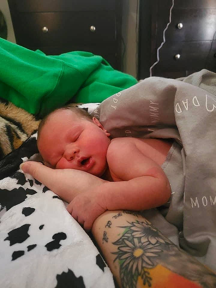 Ayvah is registered to the contest to win money with this photo: abdomen, baby, barechested, cheek, chest, comfort, elbow, event, eye, human_body, human_leg, joint, knee, muscle, person, skin, stomach, tattoo, thigh, toddler