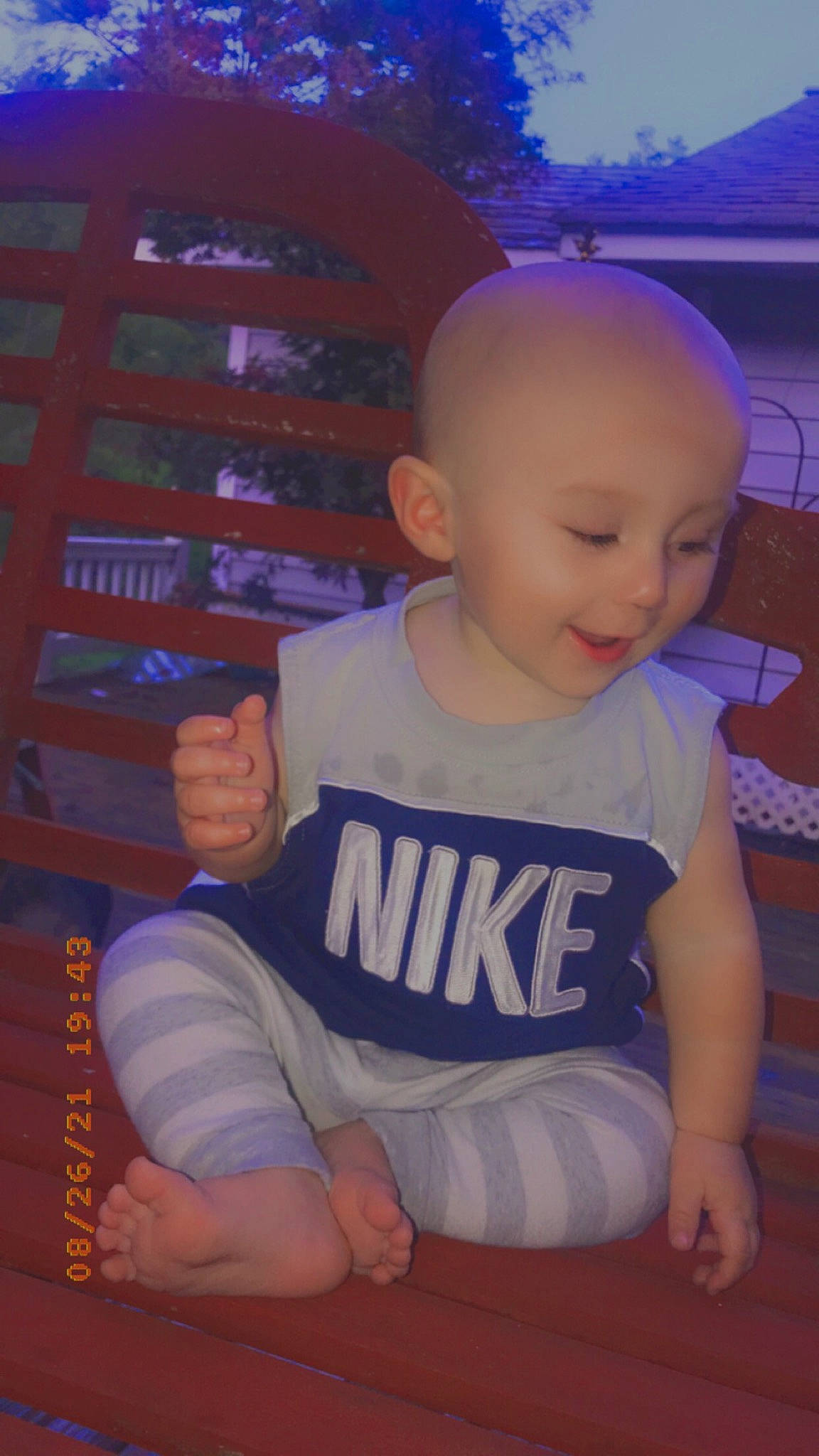 Christian is registered to the contest to win money with this photo: baby, baby_toddler_clothing, child, chin, electric_blue, finger, fun, happy, knee, leisure, magenta, person, pink, sitting, sky, sleeve, smile, t_shirt, thigh, thumb