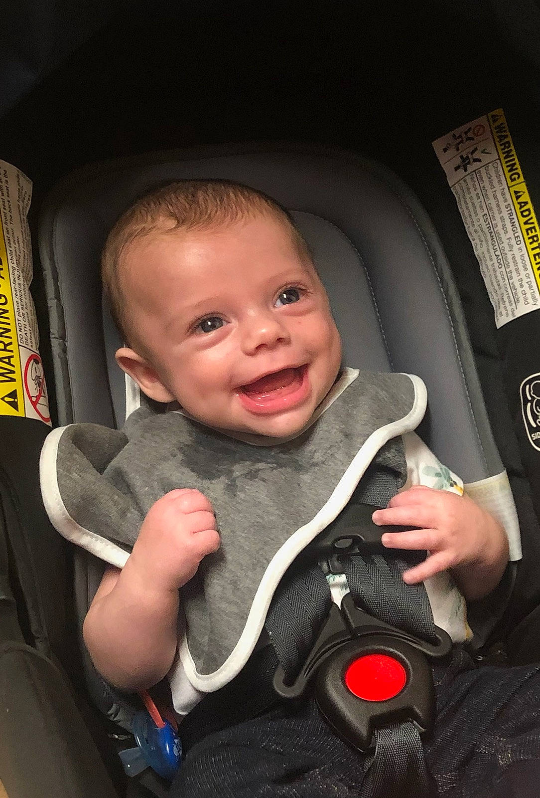 Oliver is registered to the contest to win money with this photo: auto_part, automotive_design, baby, baby_carriage, baby_products, car_seat, cheek, child, comfort, family_car, finger, flash_photography, gesture, happy, joy, nail, person, seat_belt, smile, thumb