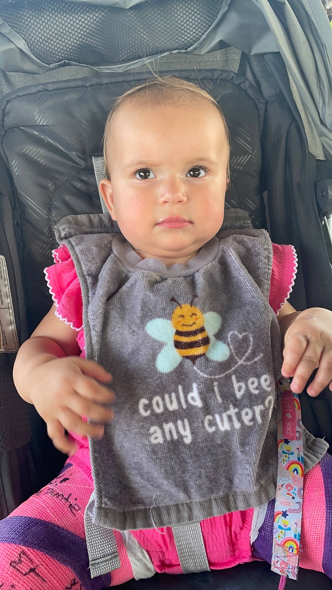 Coralynn is registered to the contest to win money with this photo: baby, baby_products, baby_toddler_clothing, cheek, child, cool, facial_expression, finger, gesture, happy, human, lip, outerwear, person, pink, product, sitting, skin, sleeve, thumb