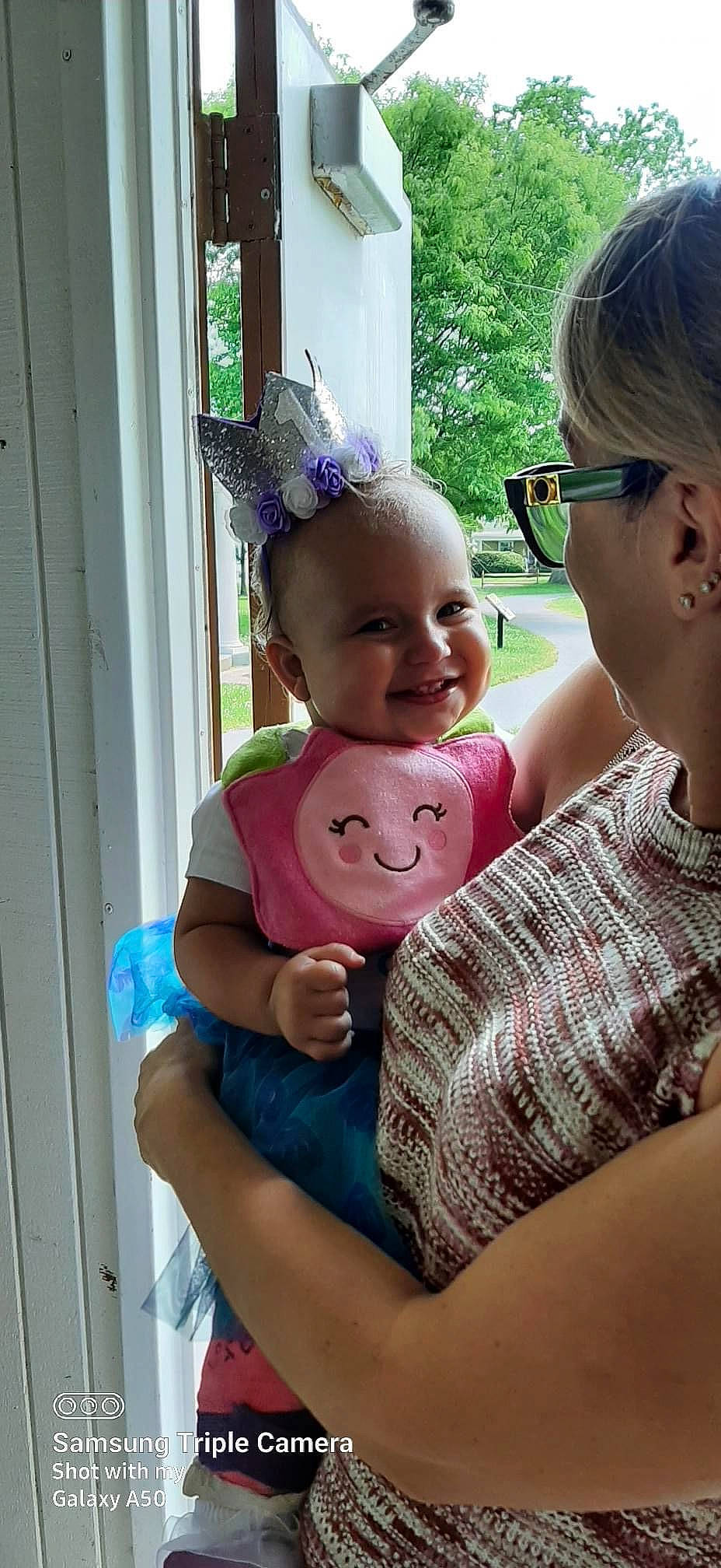 Coralynn joined the competition — help win amazing prizes! baby, baby_toddler_clothing, door, eye, facial_expression, fun, gesture, glasses, hair, happy, head, iris, joy, person, pink, plant, skin, smile, thigh, toddler