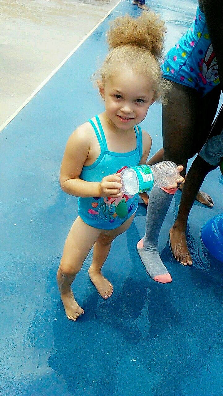 Skyla joined the competition — help win amazing prizes! blue, child, day, fun, girl, human_hair_color, infant, joy, leg, leisure, person, play, recreation, skin, smile, summer, swimmer, toddler, vacation, water