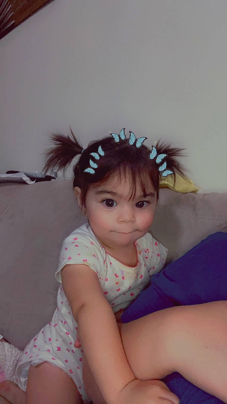 Adalina joined the competition — help win amazing prizes! baby_toddler_clothing, black_hair, costume_hat, ear, embellishment, eyebrow, eyelash, feather, flash_photography, happy, headband, headgear, headpiece, iris, jewellery, person, pink, skin, sleeve, thigh