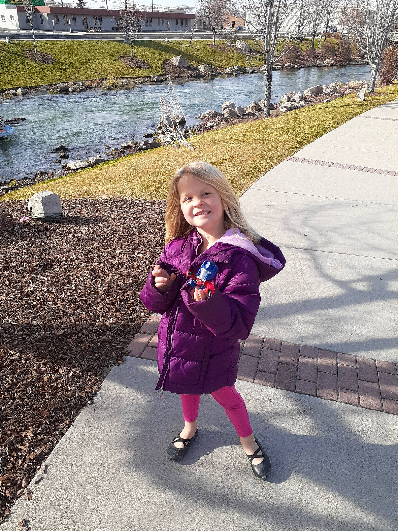 Teigan is registered to the contest to win money with this photo: child, fun, happy, joy, person, pink, plant, purple, recreation, smile, snow, toddler, tree, vacation, walking, winter