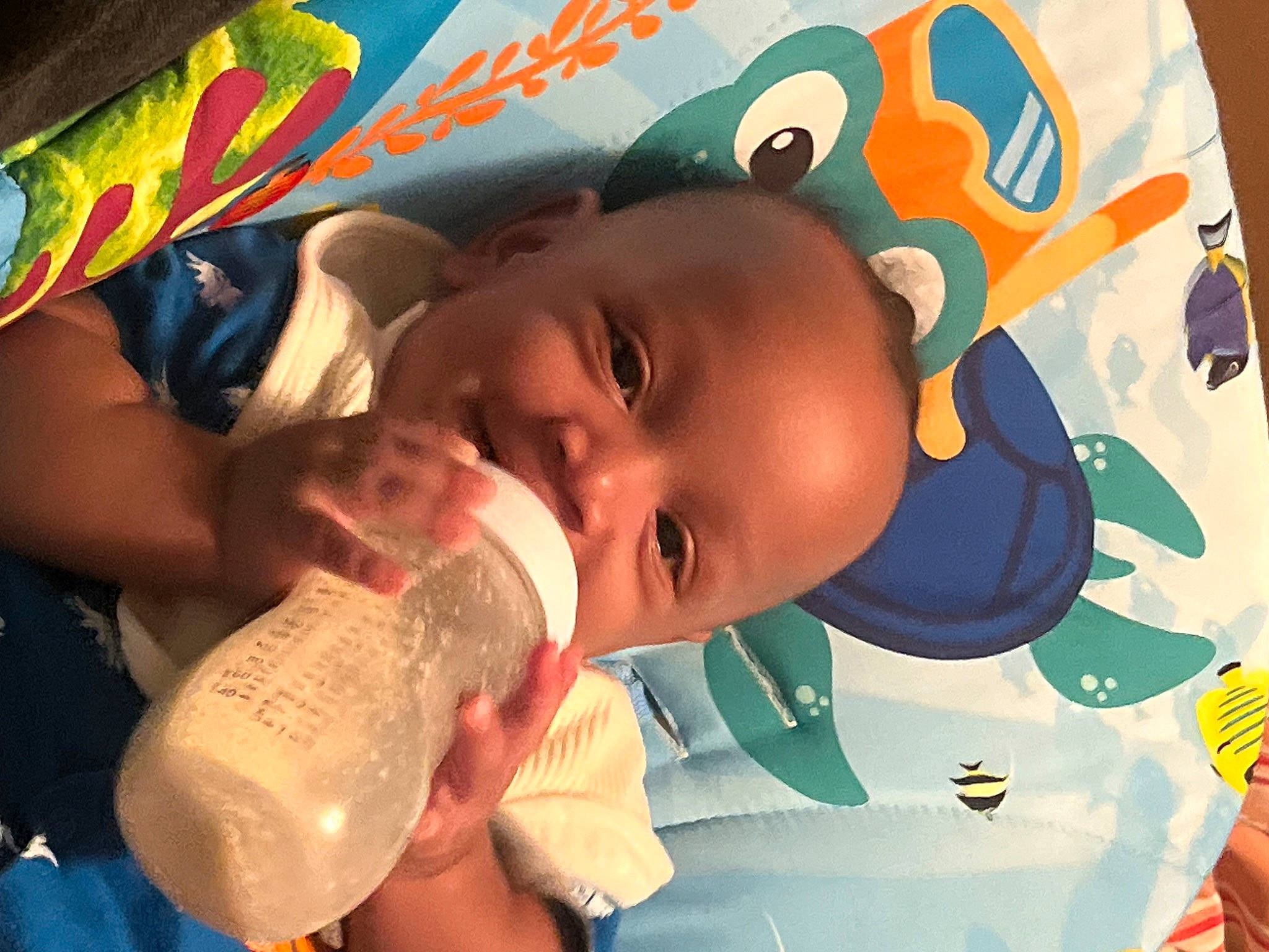 Darius joined the competition — help win amazing prizes! baby, baby_bottle, baby_products, baby_toddler_clothing, bottle, cheek, child, drink, drinking, drinkware, event, fun, green, happy, person, plastic_bottle, product, skin, smile, toddler