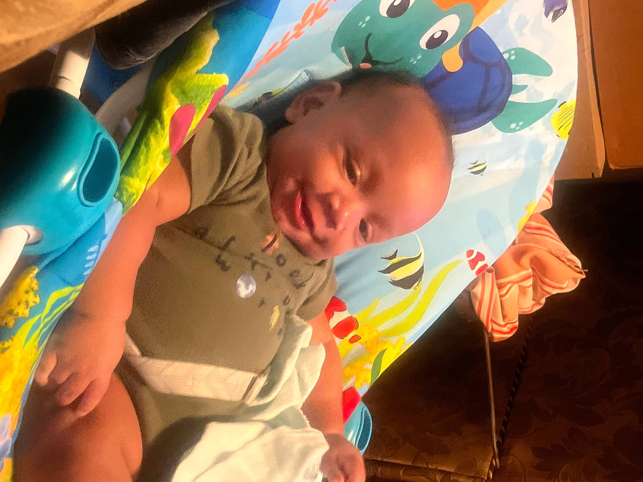 Darius is registered to the contest to win money with this photo: baby, baby_products, baby_toddler_clothing, baby_toys, bedtime, child, comfort, fun, green, happy, leisure, person, play, room, toddler, vacation