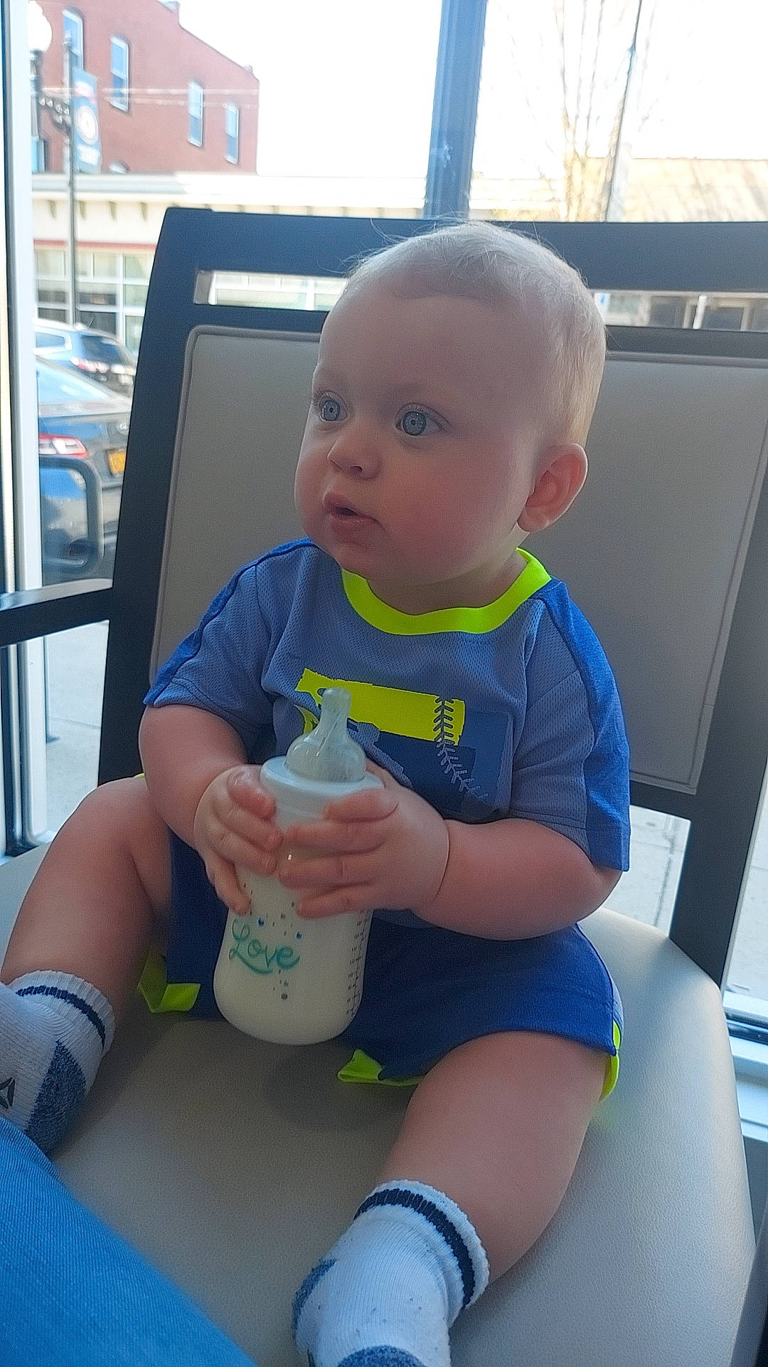 Jett joined the competition — help win amazing prizes! baby, baby_bottle, baby_toddler_clothing, bottle, cheek, child, electric_blue, finger, fun, human_leg, joint, knee, person, plastic_bottle, product, sitting, skin, standing, thigh, thumb