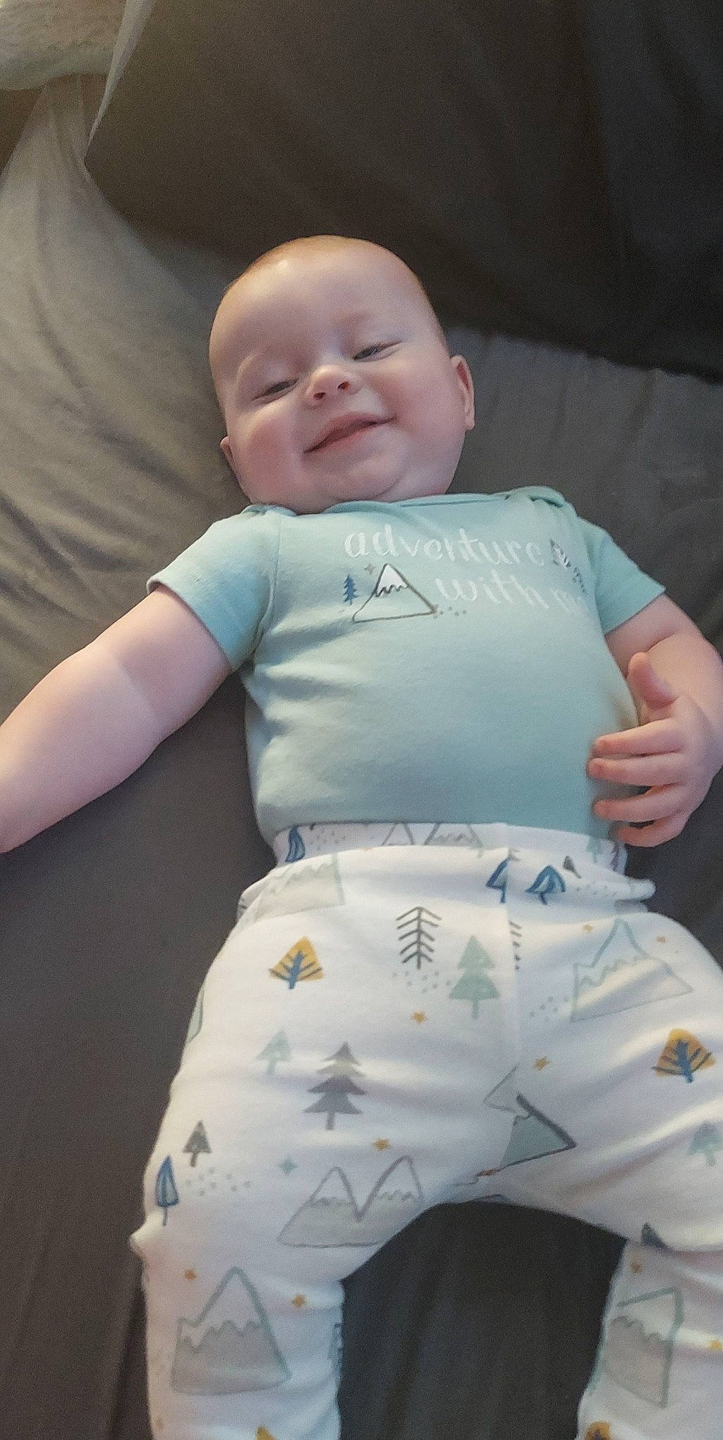 Jett joined the competition — help win amazing prizes! baby, baby_sleeping, baby_toddler_clothing, cheek, child, comfort, eye, finger, gesture, hand, happy, head, person, product, skin, sleeve, smile, t_shirt, textile, toddler