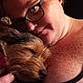 accessories, adult, airedale, animal, bodypart, canine, dog, face, female, finger, glasses, hand, head, person, pet, photography, portrait, puppy, terrier, woman