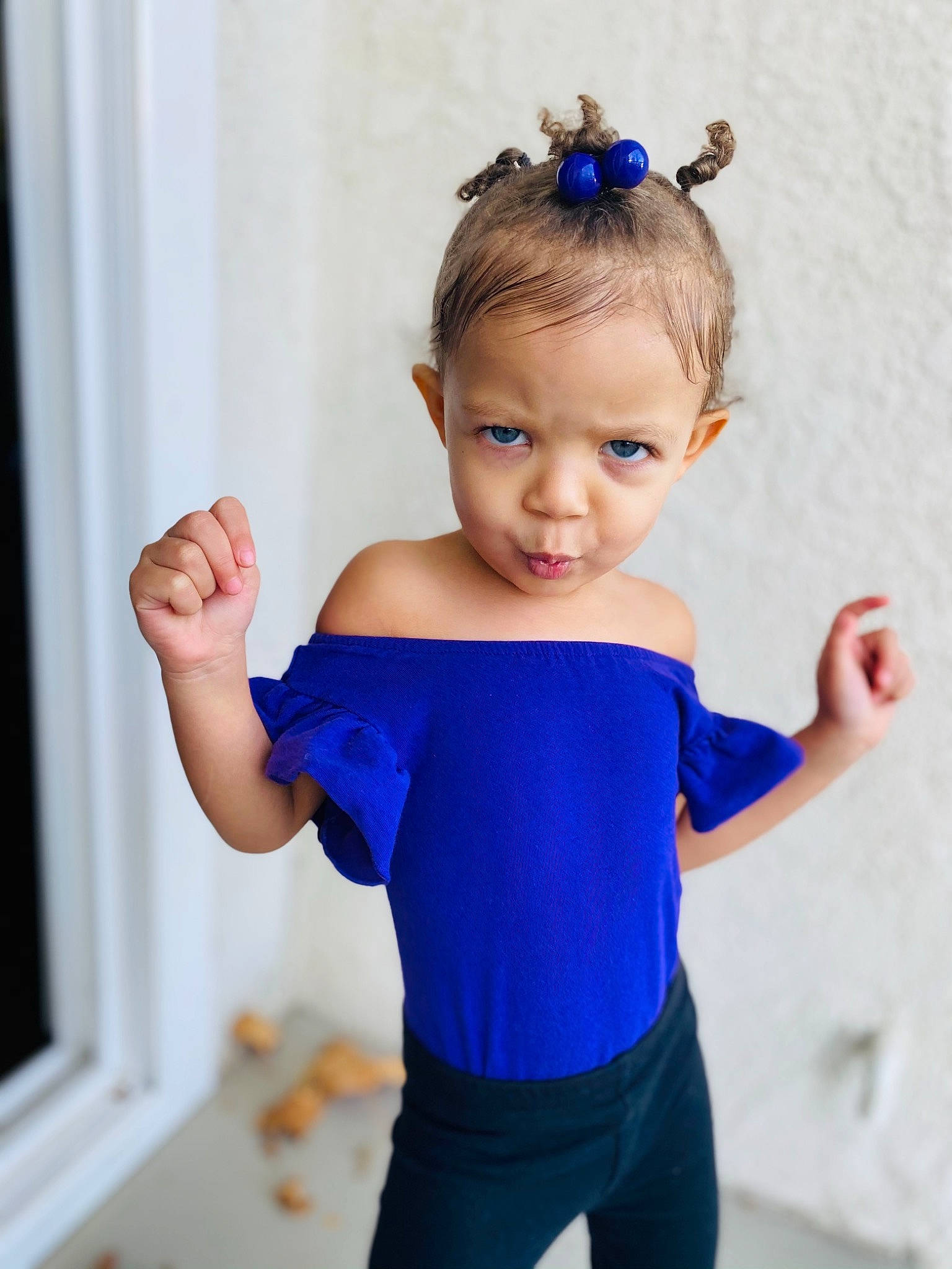 Jazlynn is registered to the contest to win money with this photo: arm, azure, baby_toddler_clothing, face, finger, gesture, hair, happy, head, headgear, joint, neck, person, product, purple, shoulder, sleeve, standing, textile, toddler