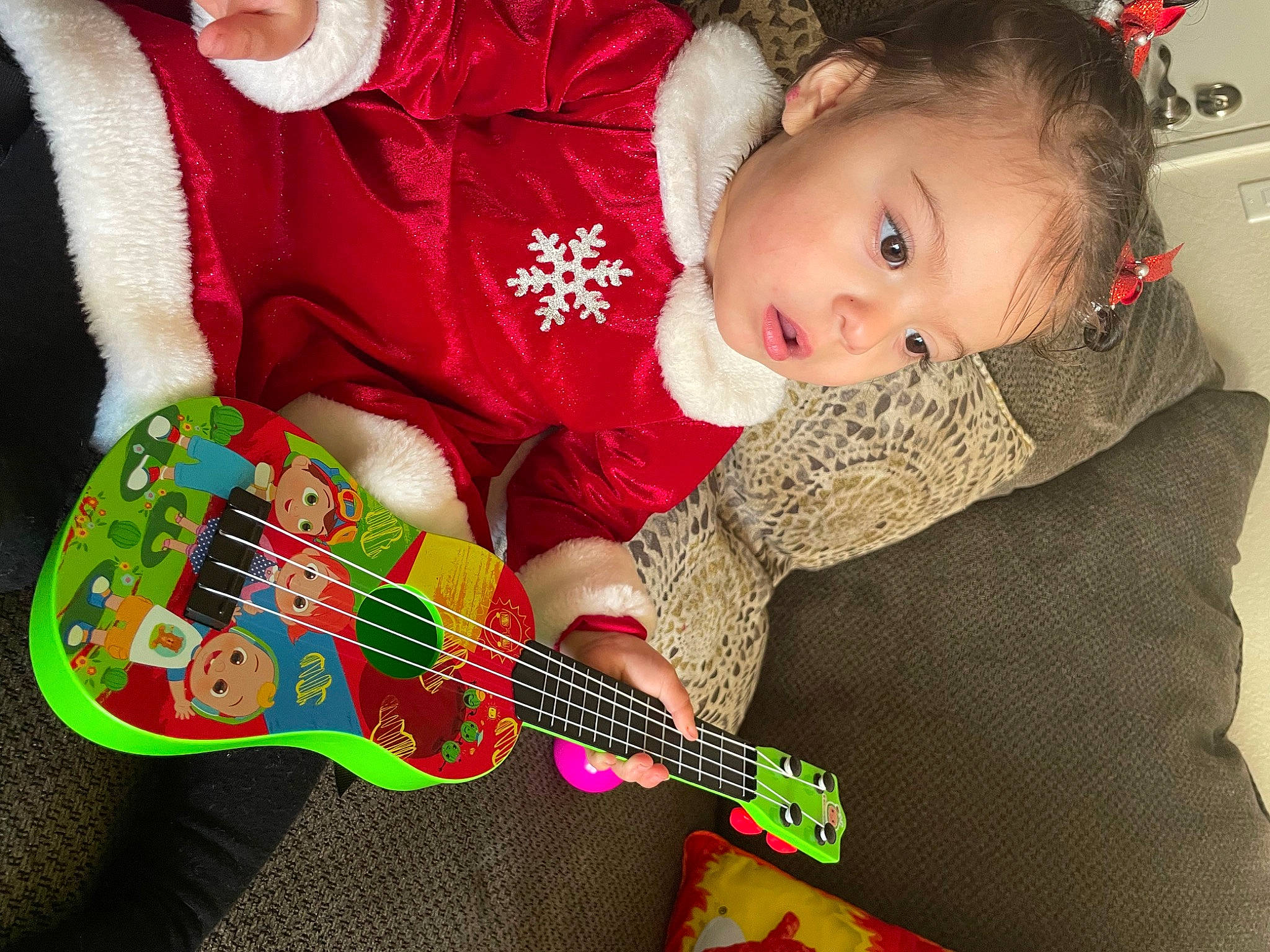 Sophia joined the competition — help win amazing prizes! baby, baby_products, baby_toddler_clothing, child, comfort, event, finger, fun, guitar, guitar_accessory, happy, musical_instrument, musical_instrument_accessory, person, plucked_string_instruments, sleeve, smile, string_instrument, string_instrument_accessory, t_shirt