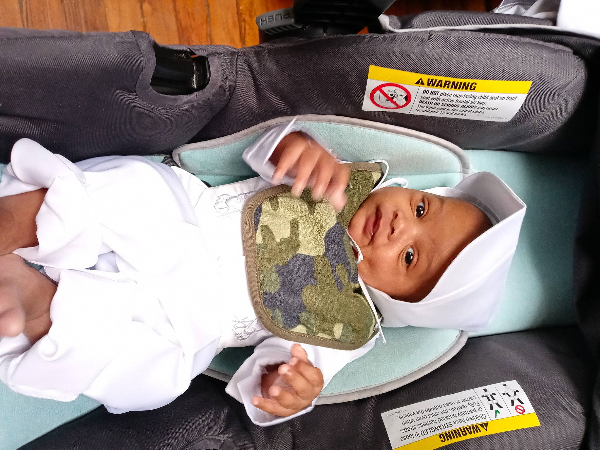 Nathaniel joined the competition — help win amazing prizes! baby, baby_products, baby_safety, baby_toddler_clothing, bag, child, comfort, facial_expression, hat, headwear, linens, person, room, sleeve, smile, toddler