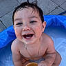 baby, child, smiling, pool, water, blue, cup, wet_hair, happy, outdoor, skin, gold_chain, bracelet, splashing, summer, play, sitting, closeup, person, fun