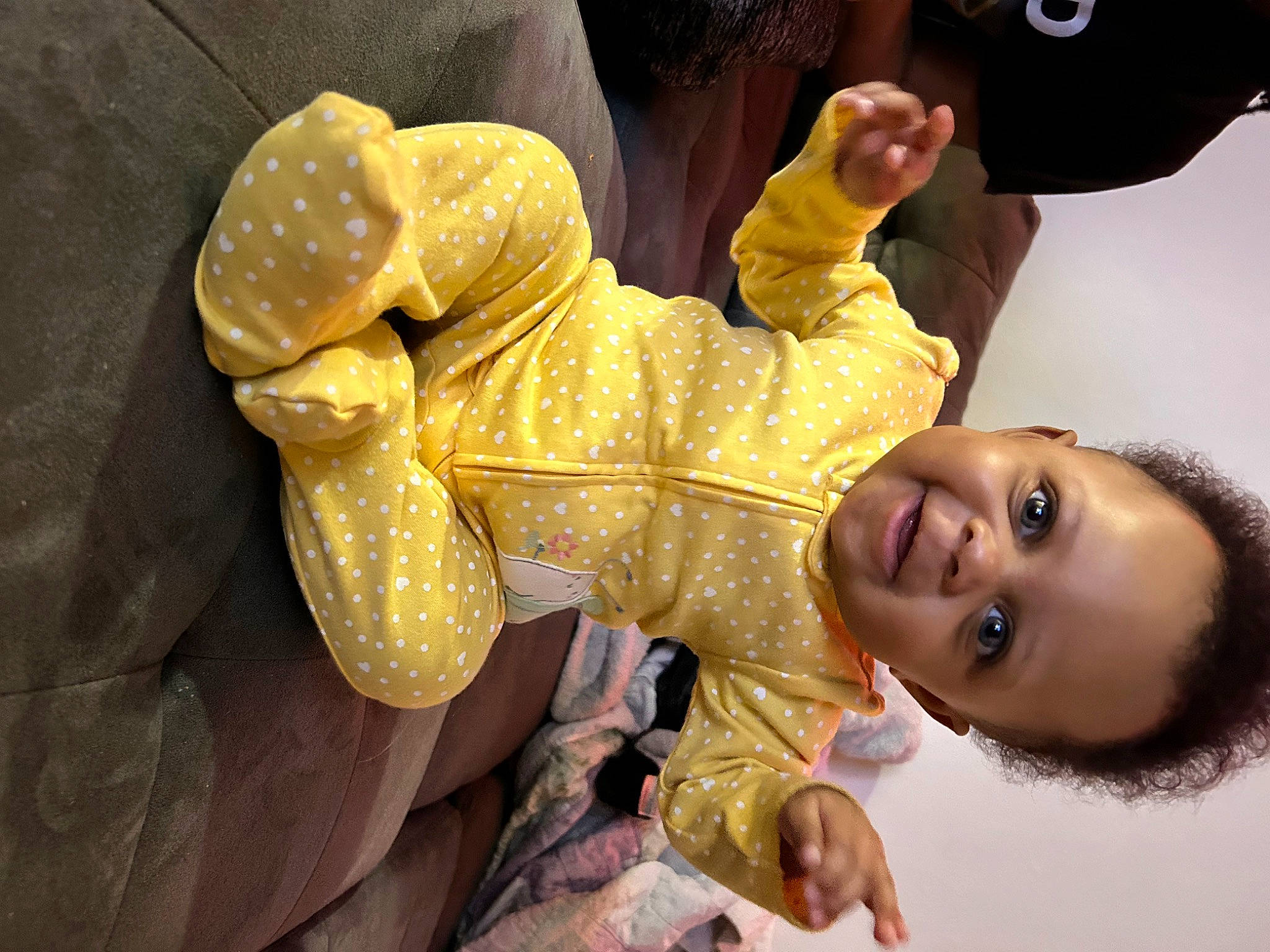 Jaliyah is registered to the contest to win money with this photo: arm, baby, child, ear, event, finger, fun, gesture, hairstyle, hand, happy, human_body, mouth, nose, person, skin, smile, thumb, toddler, tree