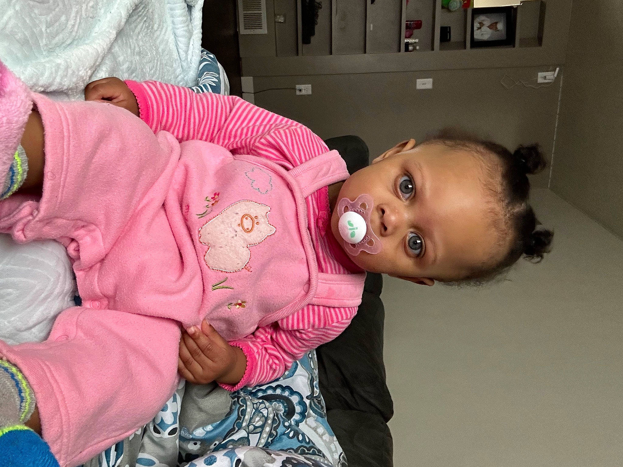 Jaliyah is registered to the contest to win money with this photo: baby, baby_toddler_clothing, cheek, child, comfort, ear, event, fun, happy, human_body, magenta, mouth, nose, person, room, sitting, skin, toddler