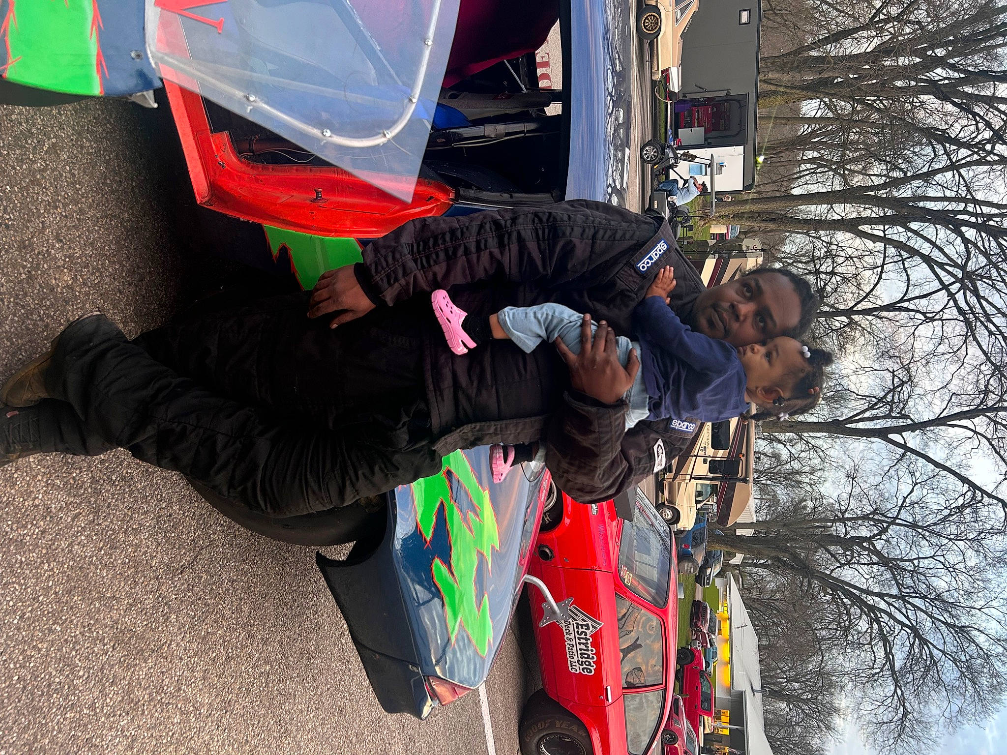 Ablessing Simpson joined the competition — help win amazing prizes! asphalt, auto_part, automotive_exterior, automotive_tire, car, event, fun, jacket, motor_vehicle, pedestrian, person, personal_protective_equipment, recreation, road_surface, sky, street, tire, tree, vehicle, vehicle_door