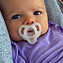 Violet Mae joined the competition — help win amazing prizes! baby, blue_eyes, child, close_up, comfort, cushion, cute, face, head, indoors, infant, newborn, pacifier, patterned_fabric, portrait, purple_clothing, resting, skin, soft_light, young_child