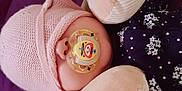 Ana-maria is registered to the contest to win money with this photo: baby, beige, cap, child, hand, headgear, nail, peach, pink, stuffed_toy, sweetness