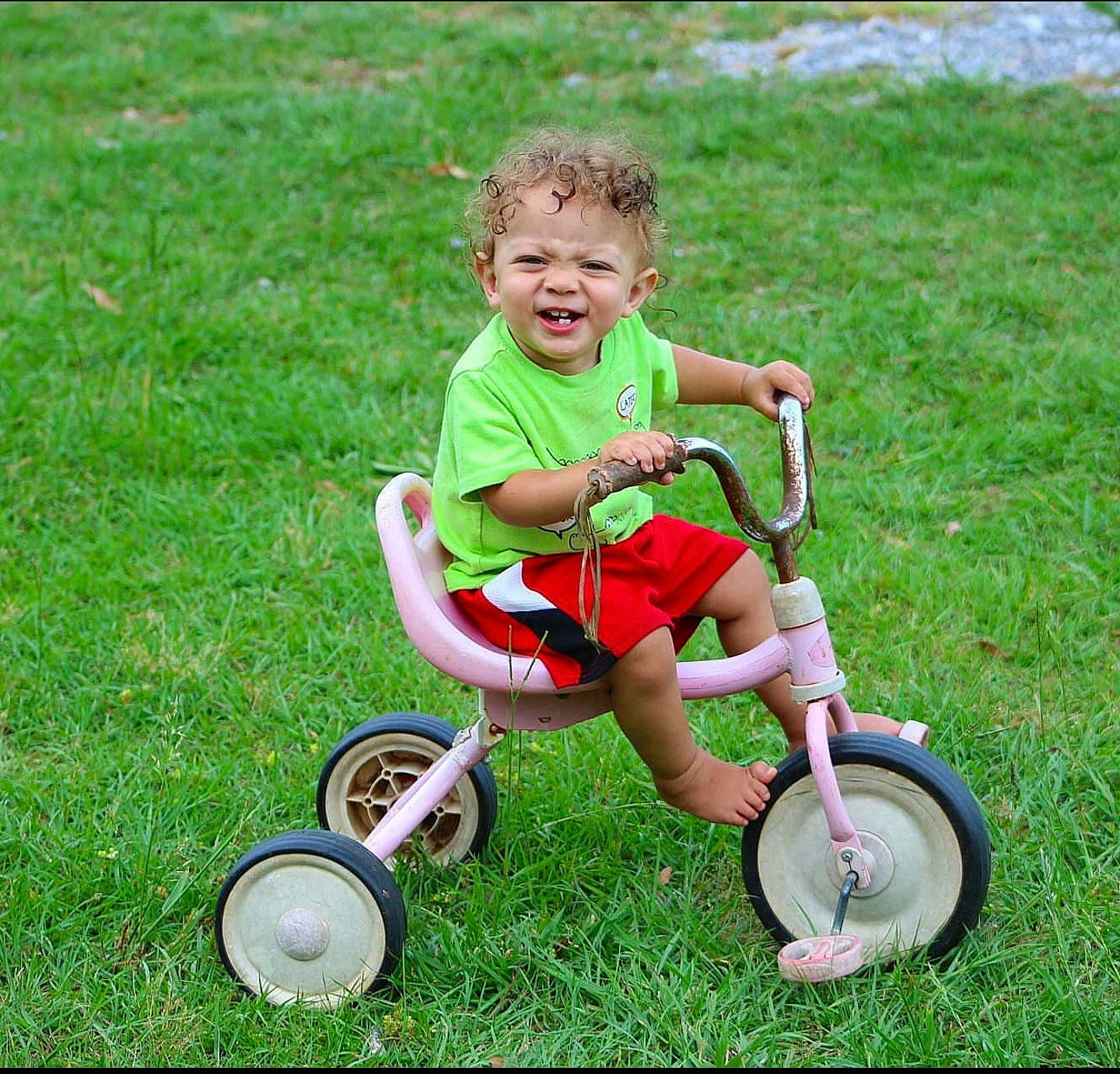 Preston joined the competition — help win amazing prizes! child, fun, grass, lawn, person, play, product, riding_toy, sitting, toddler, tricycle, vehicle, wheel