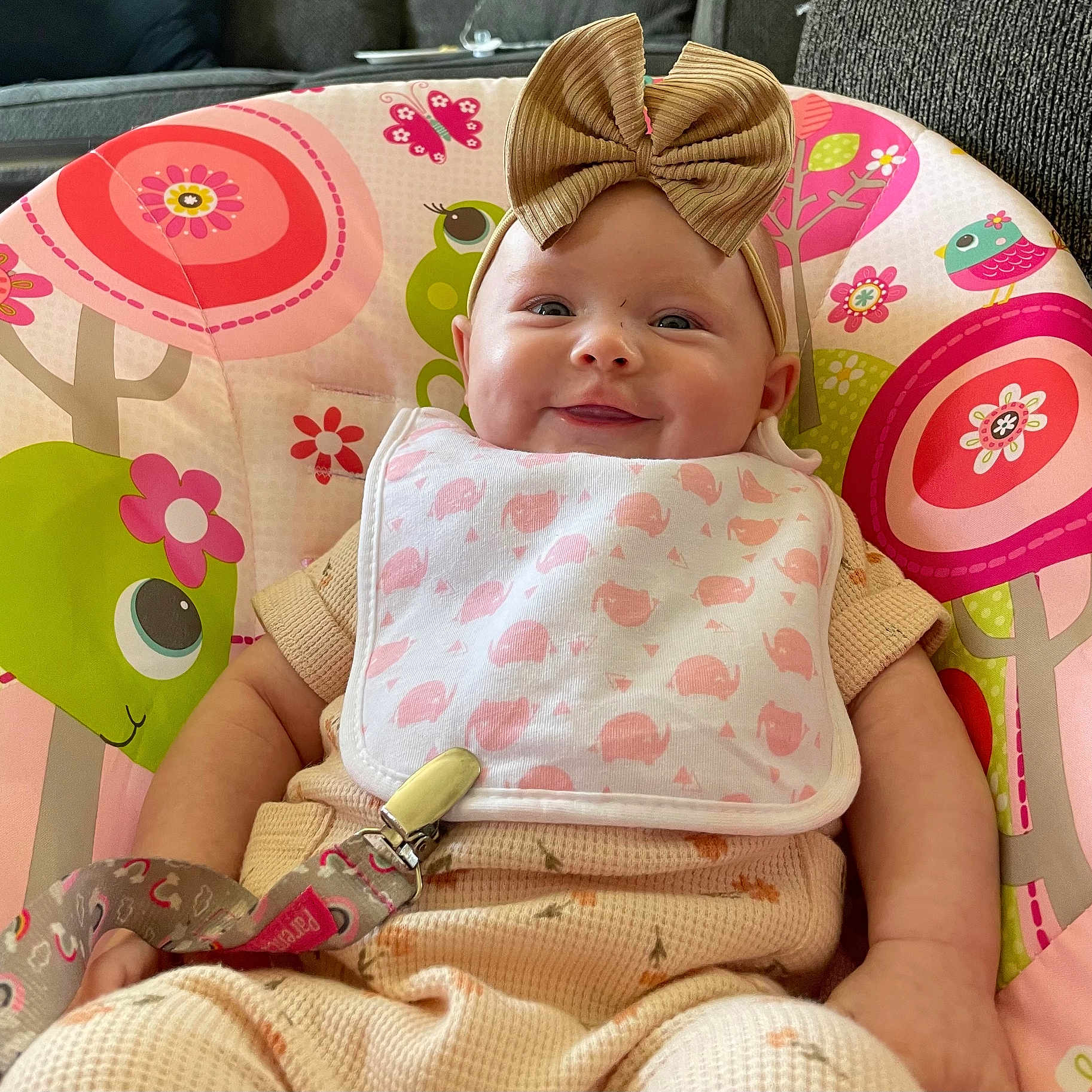 Avery is registered to the contest to win money with this photo: baby, babylaughing, bonnet, chair, clothing, couch, cushion, face, furniture, happy, hat, head, homedecor, newborn, person, photography, portrait, sitting, sleeping, t_shirt