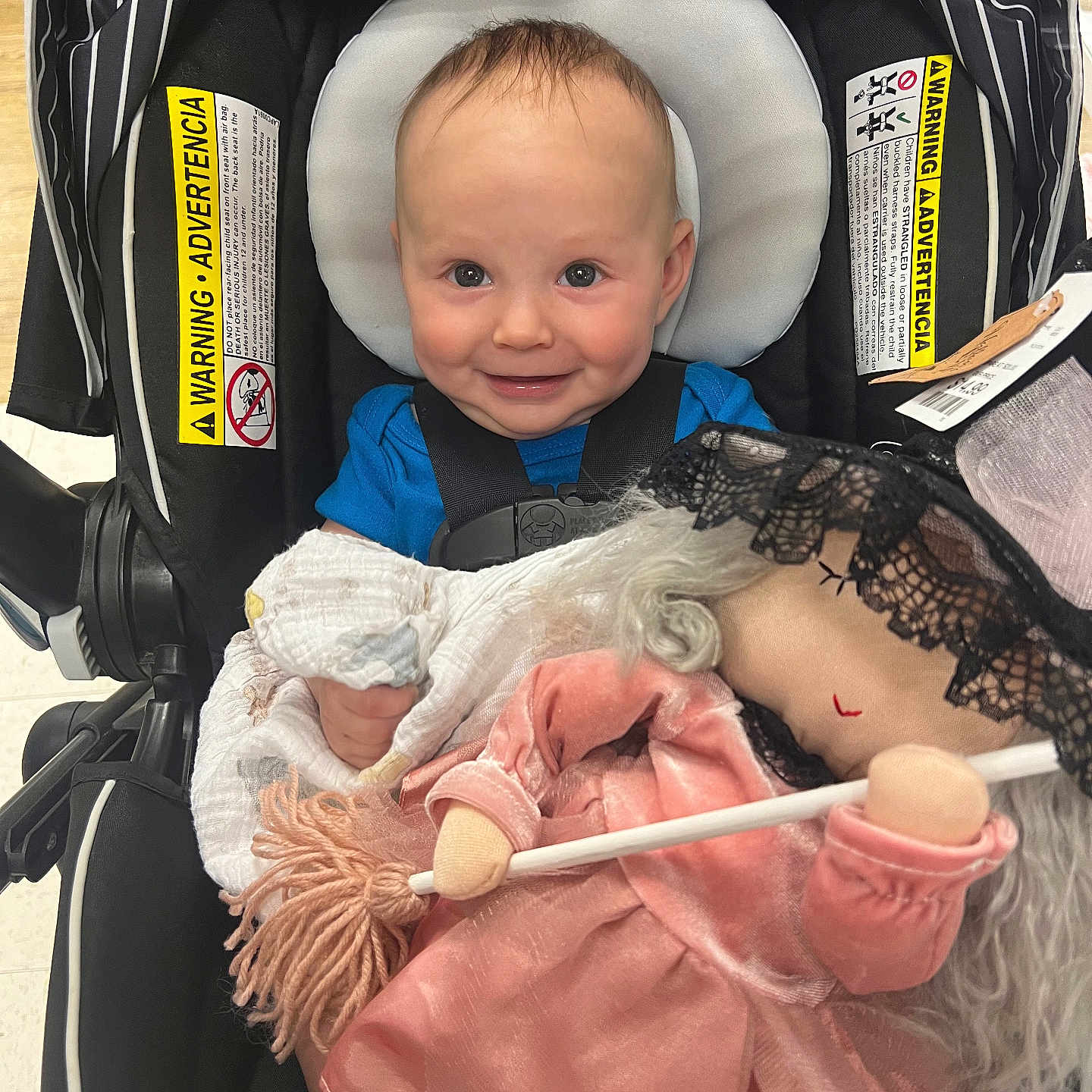 Axel is registered to the contest to win money with this photo: baby, bonnet, clothing, costume, crib, doll, face, furniture, hat, head, homedecor, infantbed, newborn, person, photography, portrait, stroller, toy, transportation, vehicle