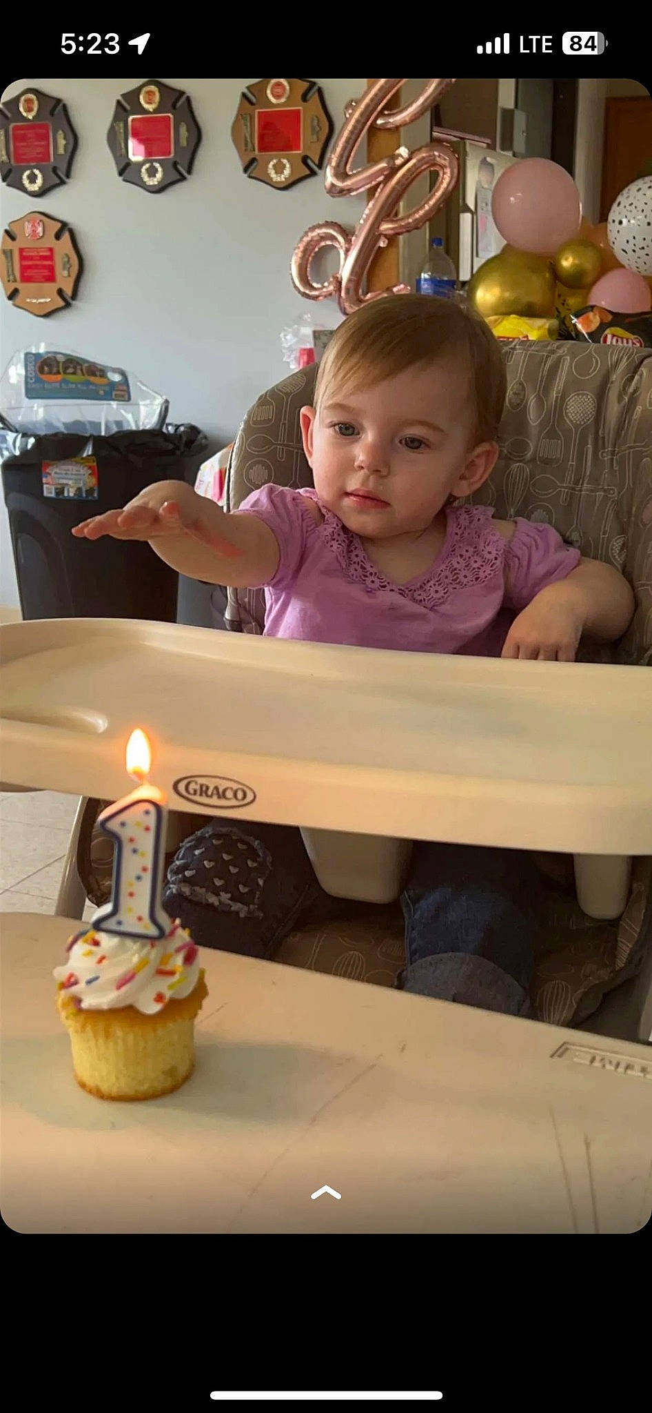 Brielle is registered to the contest to win money with this photo: baby, birthday_cake, birthday_candle, cake_decorating, candle, child, cuisine, dessert, drinkware, event, food, fun, happy, icing, ingredient, person, plate, snapshot, t_shirt, tableware