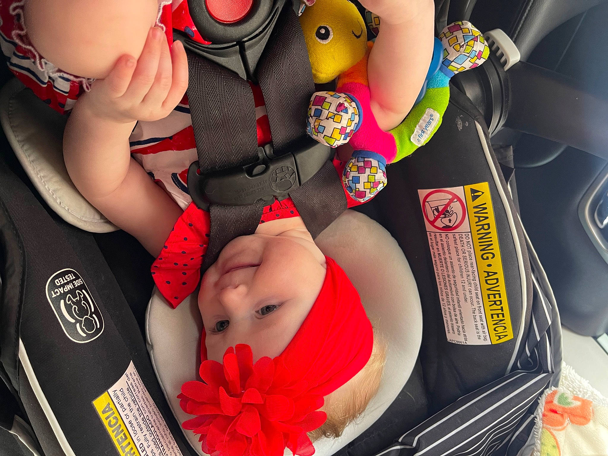 Maeve joined the competition — help win amazing prizes! arm, automotive_design, baby, car, car_seat, child, comfort, design, finger, headwear, joy, motor_vehicle, nail, person, personal_luxury_car, product, red, snapshot, thigh, toddler