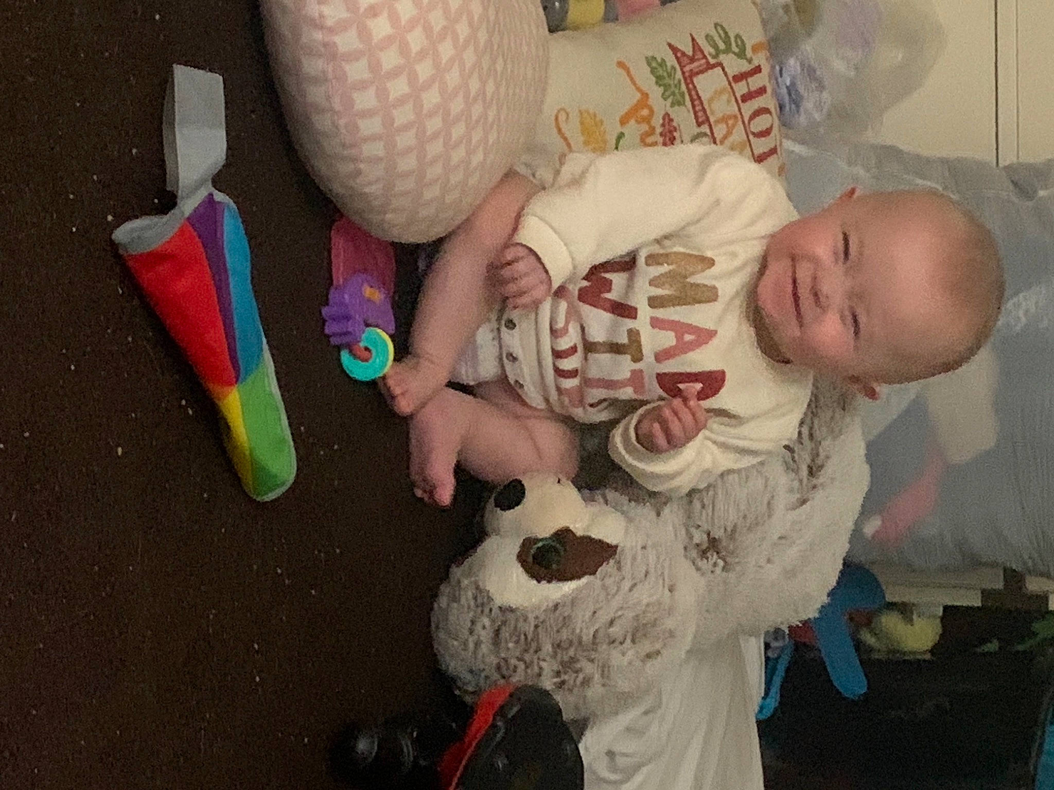 Janessa is registered to the contest to win money with this photo: baby, baby_products, baby_toddler_clothing, child, comfort, foot, fun, headgear, infant_bed, joy, nail, pattern, person, play, room, sitting, toddler, toy