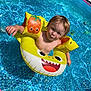 toddler, child, pool, water, swimming, floaties, inflatable, yellow, summer, outdoor, fun, playful, cute, baby, swim_ring, splash, sunlight, wet_hair, happy, blue