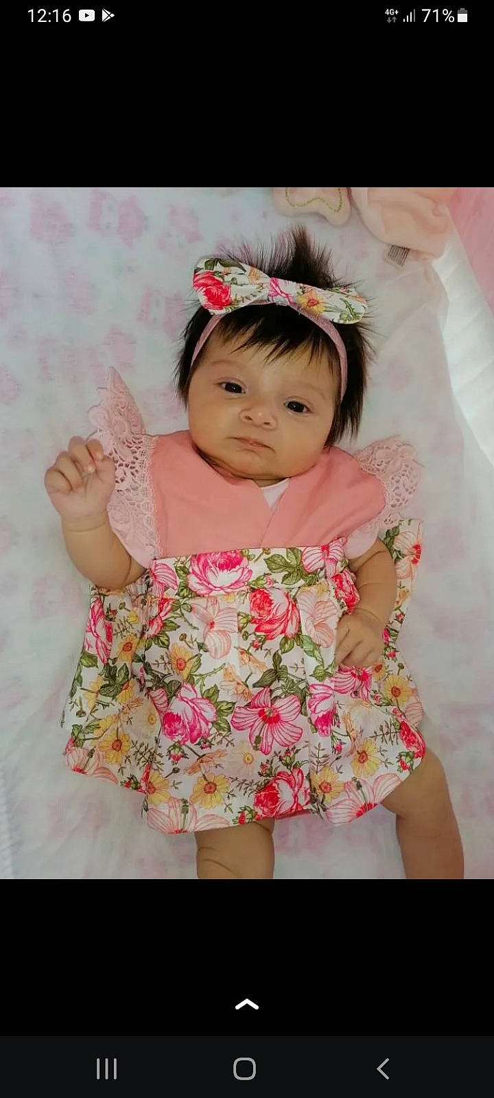 Espinos participe au concours pour gagner de l'argent avec cette photo : baby, baby_toddler_clothing, bangs, child, day_dress, dress, embellishment, eyelash, flash_photography, hand, happy, headband, headpiece, magenta, pattern, peach, person, pink, skin, sleeve