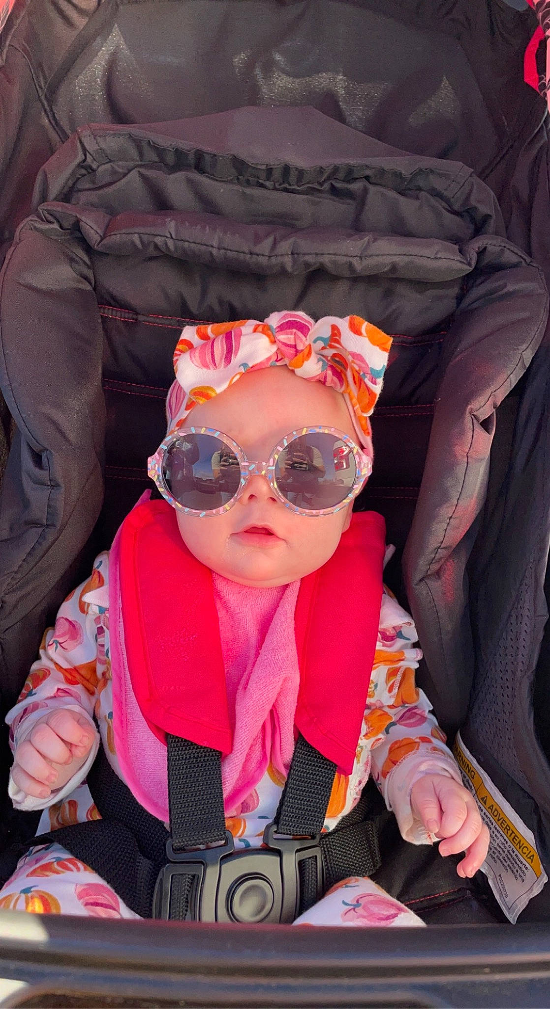 Lillie joined the competition — help win amazing prizes! beanie, cap, car_seat, carmine, child, cool, costume, eyewear, fashion_accessory, fun, glasses, goggles, magenta, person, personal_protective_equipment, pink, recreation, sleeve, sunglasses, toddler