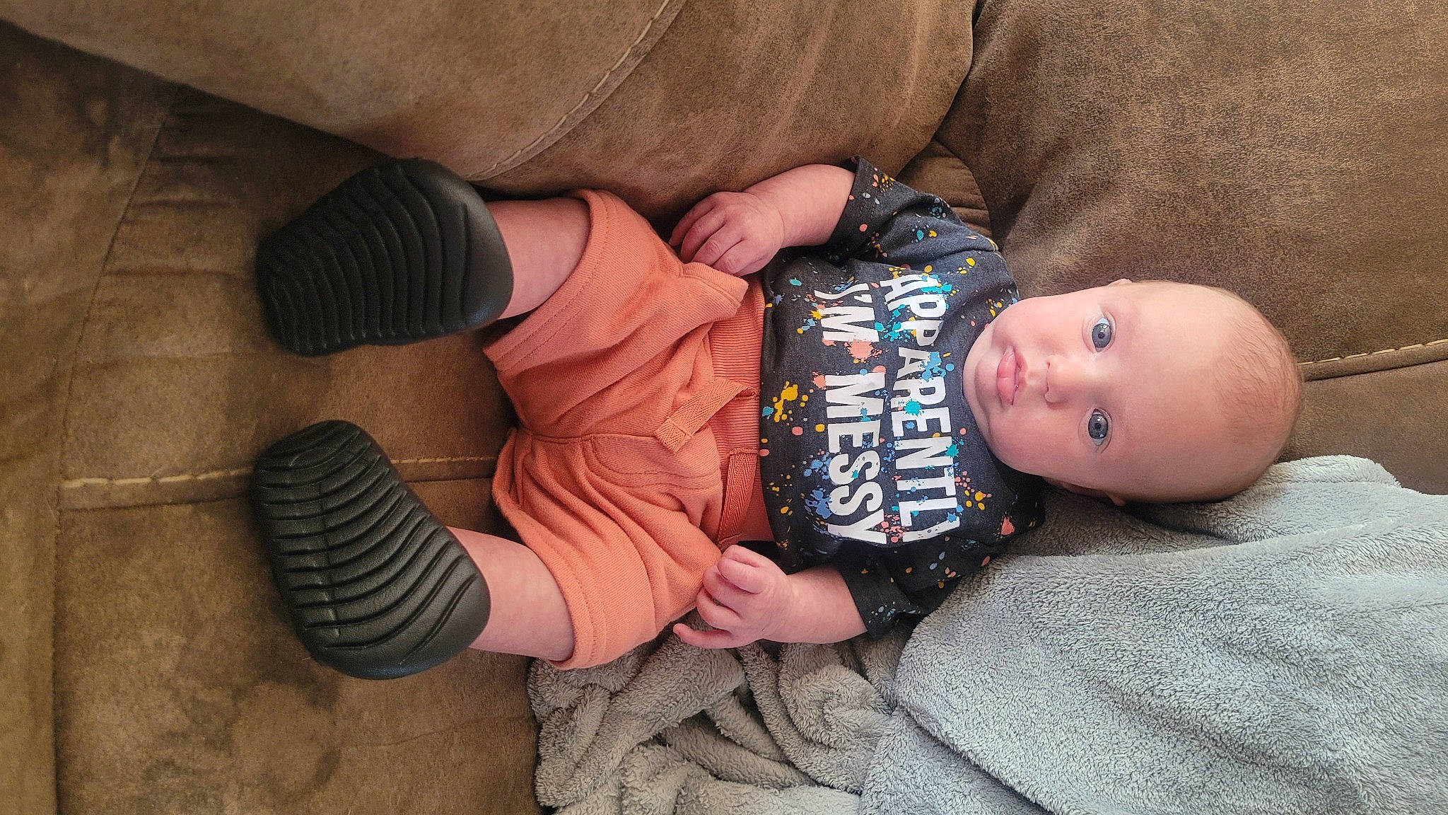 Briar is registered to the contest to win money with this photo: arm, baby, baby_toddler_clothing, cheek, child, comfort, eye, finger, gesture, hand, human_body, joint, nail, person, plant, sitting, skin, sleeve, toddler, tree