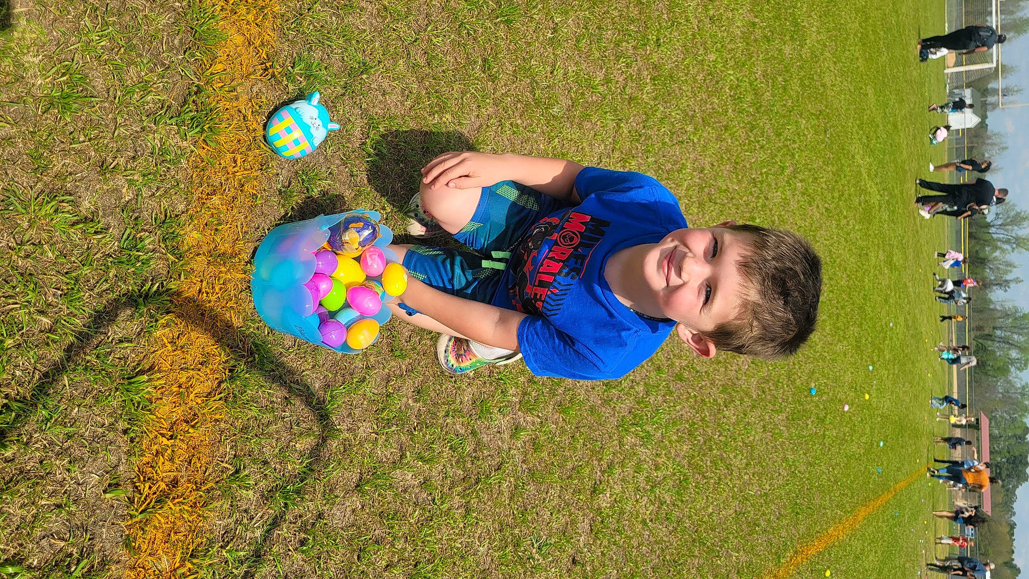Blaine is registered to the contest to win money with this photo: child, electric_blue, fun, games, grass, grass_family, grassland, happy, joy, lawn, leisure, meadow, people_in_nature, person, plant, play, public_space, recreation, smile, soil