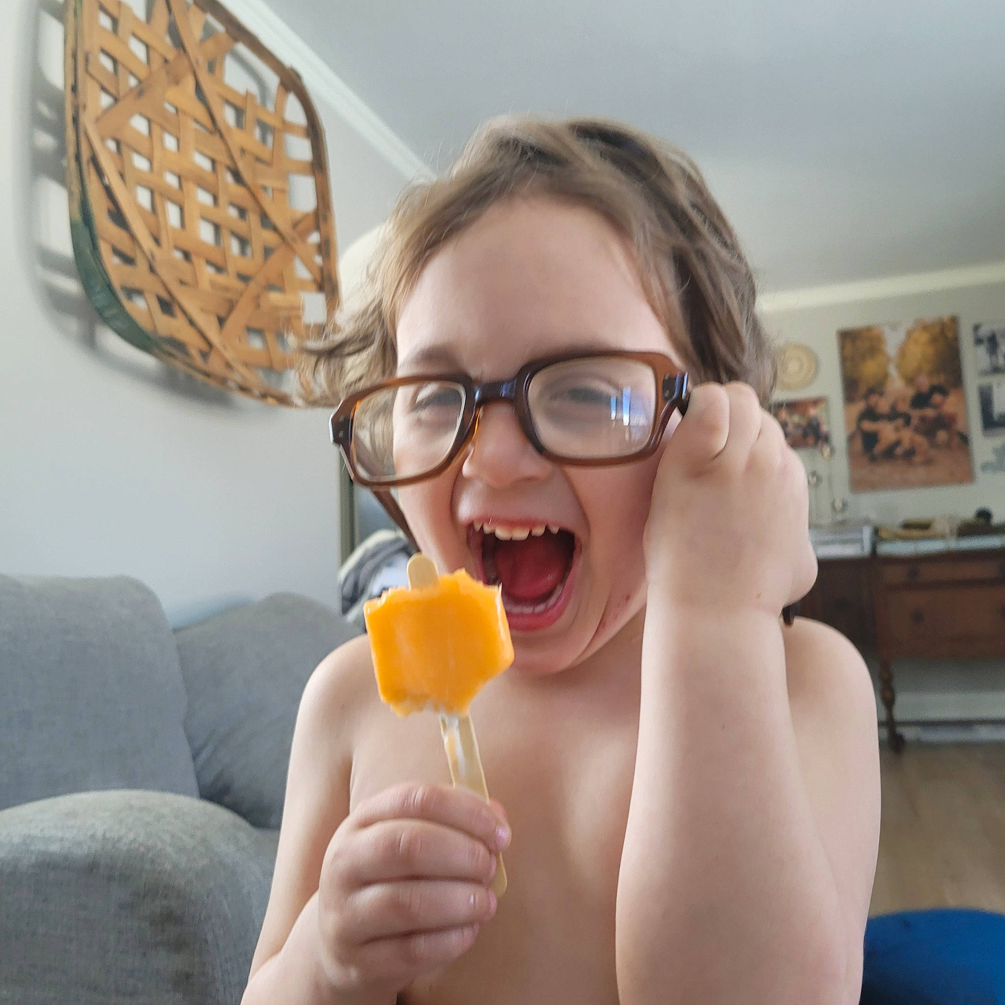 Espen is registered to the contest to win money with this photo: drink, eyewear, finger, food, fruit, gesture, glasses, hand, happy, kitchen_utensil, lip, nail, natural_foods, neck, nose, person, picture_frame, smile, spoon, tableware