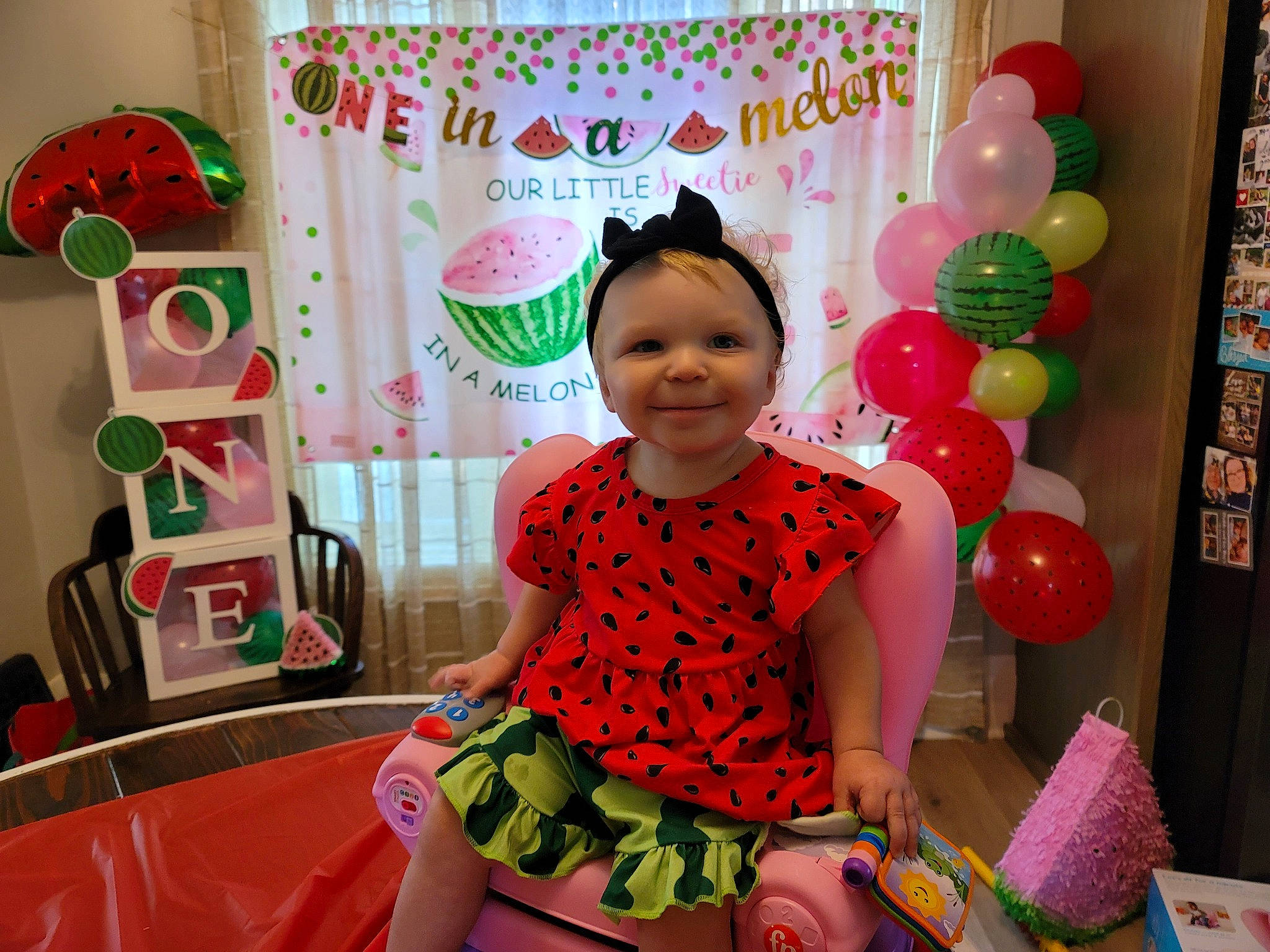 Sheiann Lakelyn joined the competition — help win amazing prizes! baby_toddler_clothing, balloon, birthday, birthday_party, child, decoration, event, fun, happy, headwear, joy, leisure, magenta, party_supply, person, pink, room, smile, sweetness, textile