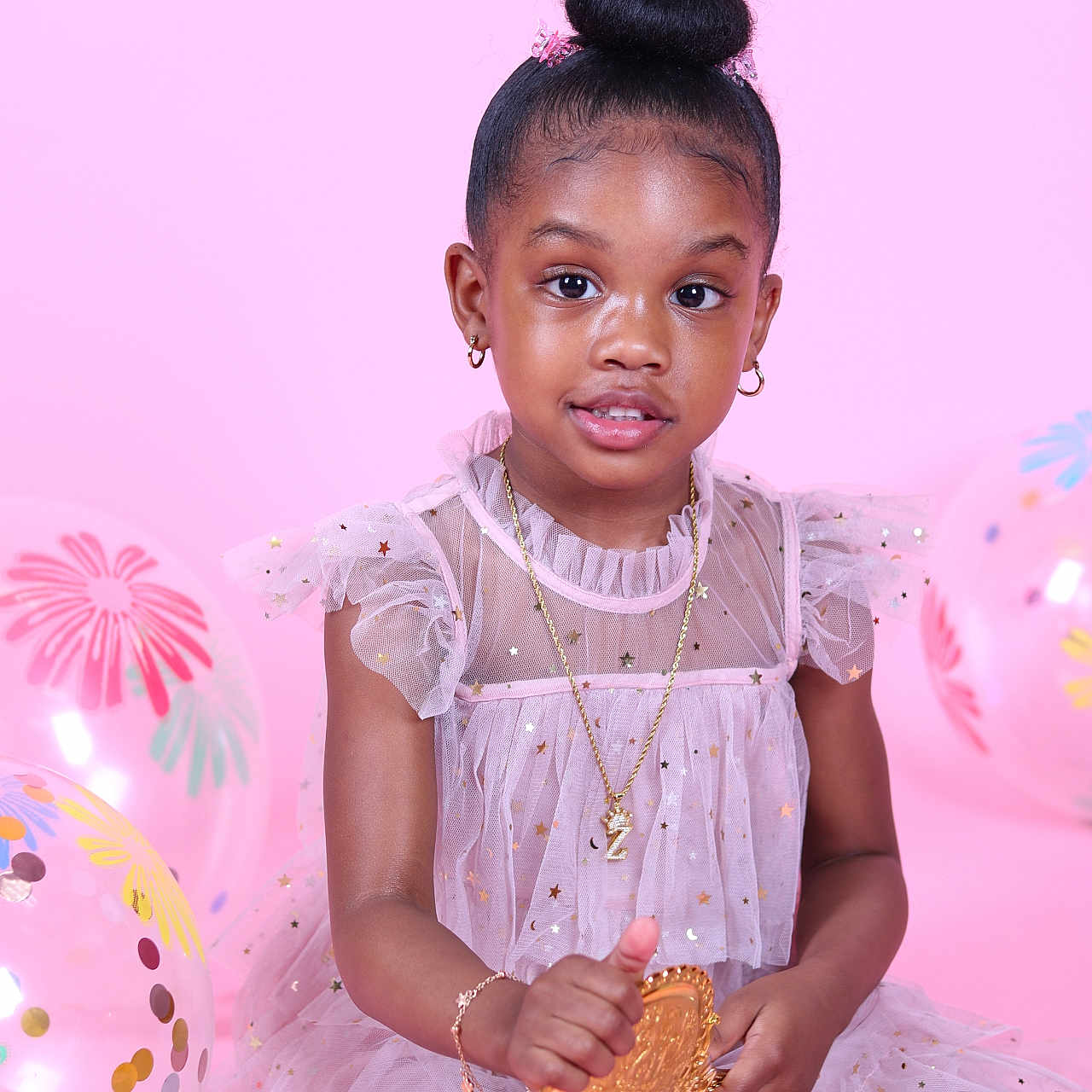 Zuri is registered to the contest to win money with this photo: accessories, bodypart, bracelet, child, clothing, dress, face, female, finger, girl, hand, happy, head, jewelry, necklace, person, photography, portrait, sitting, smile