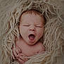 newborn, baby, yawning, blanket, soft, cozy, cute, infant, sleepy, wrapped, portrait, skin, hands, cute_face, closeup, fluffy, resting, warm, natural_light, peaceful