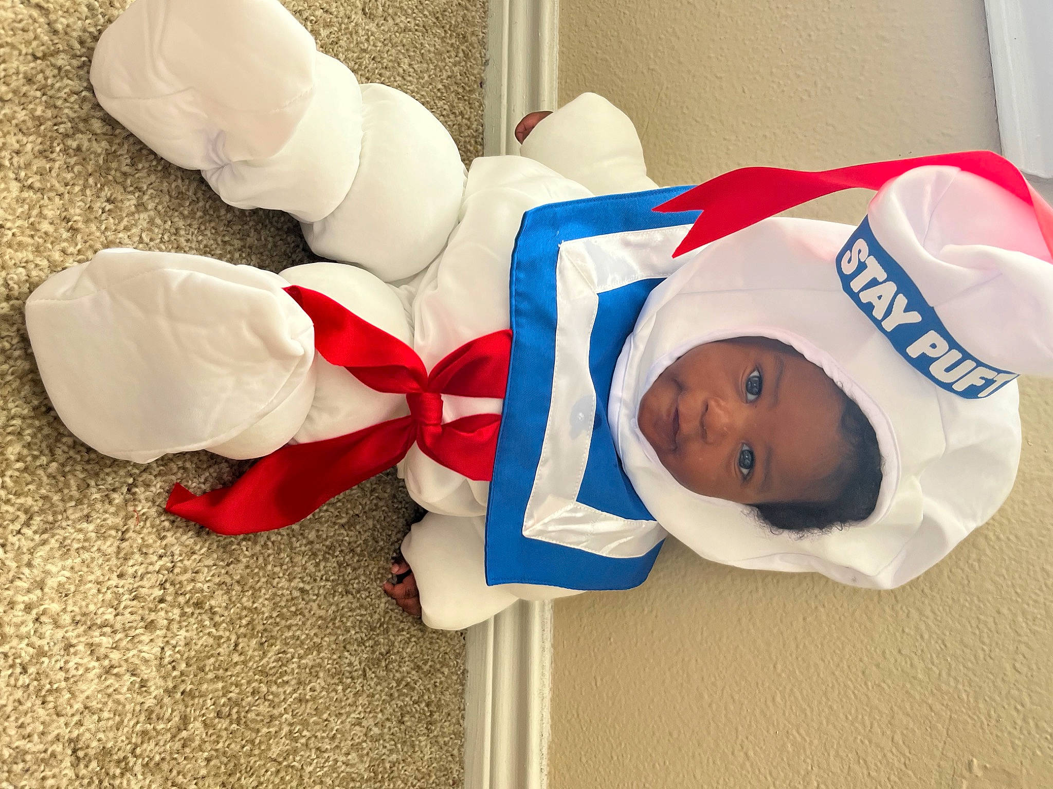 Ellis joined the competition — help win amazing prizes! baby, baby_toddler_clothing, cap, carmine, child, comfort, costume_hat, event, fictional_character, fun, happy, hat, headgear, holiday, human_leg, person, room, stuffed_toy, toddler