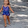 barefoot, casual, child, daylight, girl, grass, happy, joyful, nature, outdoor, playful, running, sand, shadow, smiling, summer, sunlight, swimsuit, tree, young