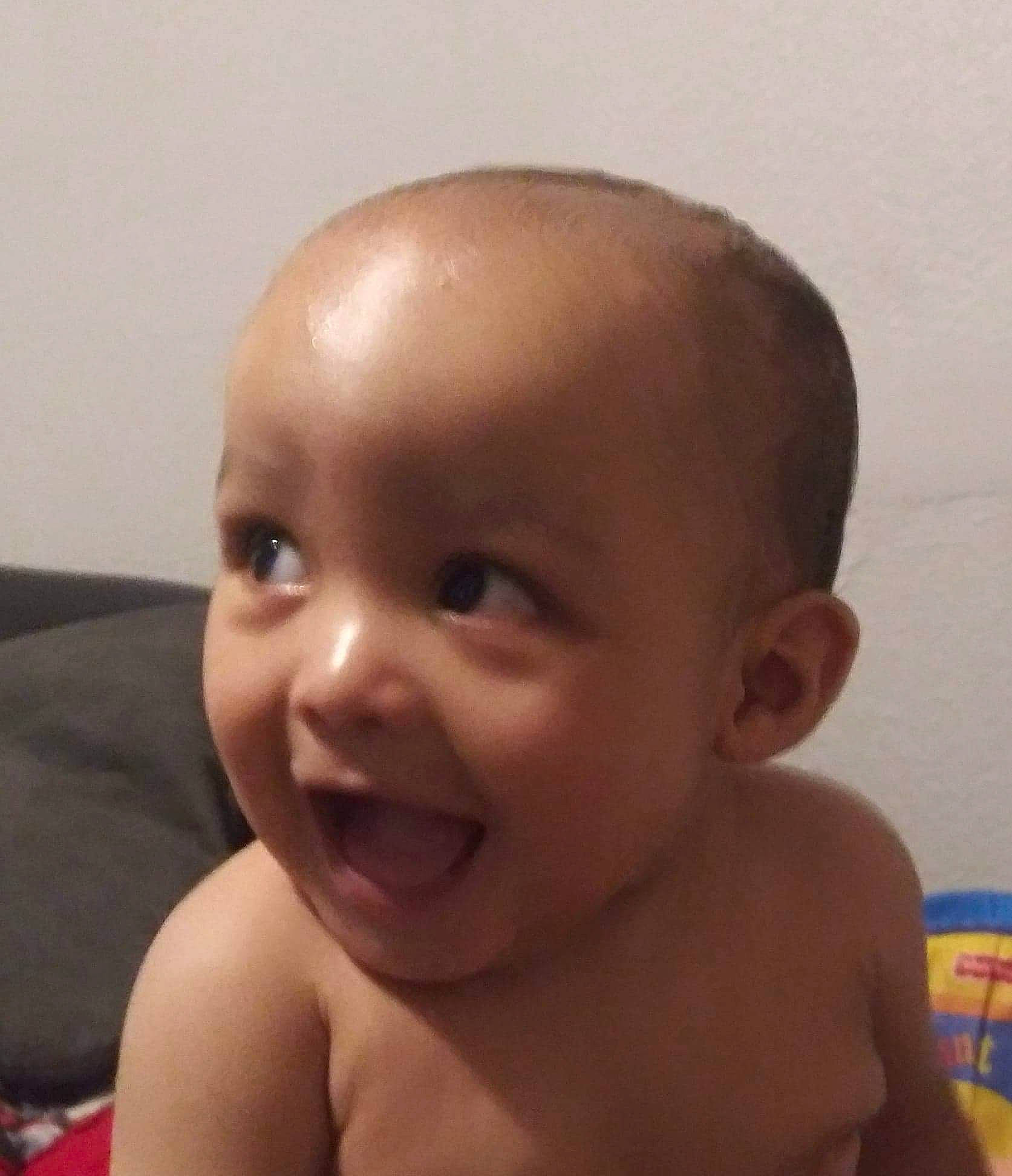 Emanuel is registered to the contest to win money with this photo: baby, baby_making_funny_faces, cheek, child, chin, ear, eyebrow, face, facial_expression, forehead, hair, hairstyle, head, lip, mouth, nose, organ, person, skin, smile