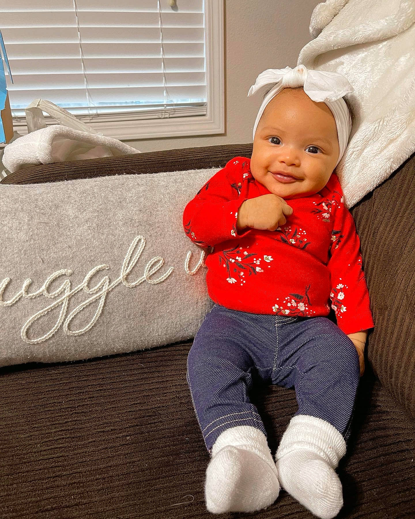 Lorelei is registered to the contest to win money with this photo: baby, baby_toddler_clothing, child, clothing, comfort, design, floor, flooring, happy, human_body, joy, linens, pattern, person, sleeve, smile, t_shirt, toddler, white, window