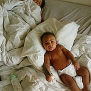 Zymir joined the competition — help win amazing prizes! baby, bed, blanket, bottle, child, comforter, cozy, diaper, family, indoor, infant, nap, person, pillow, relaxation, rest, sibling, sleeping, toy, white