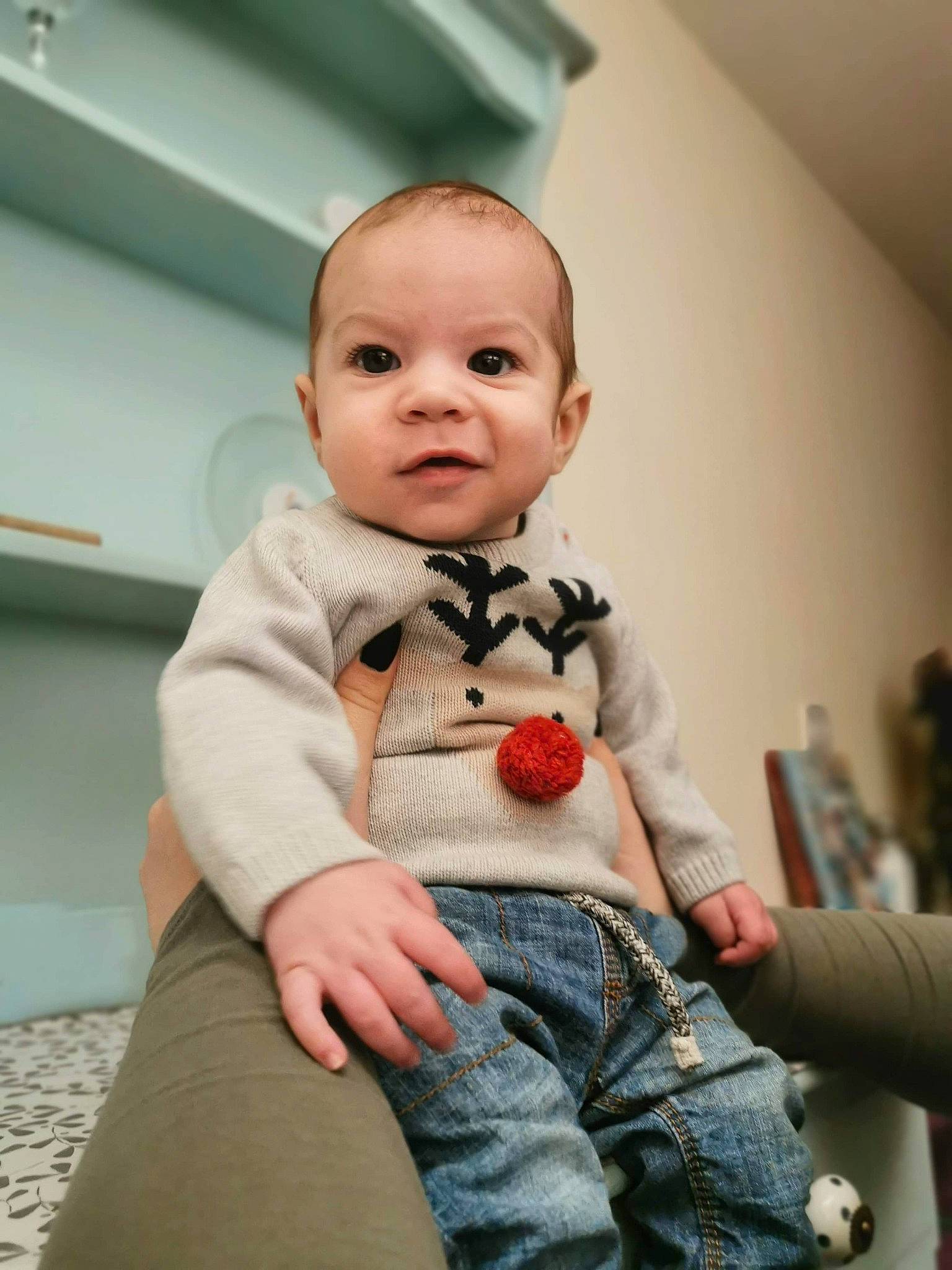 Dennis is registered to the contest to win money with this photo: baby, baby_toddler_clothing, cheek, child, collar, comfort, flash_photography, flooring, fur, happy, jeans, nose, pattern, person, portrait_photography, sitting, sleeve, standing, toddler, toy