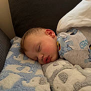 Kairo joined the competition — help win amazing prizes! baby, sleeping, blanket, elephant_pattern, pajamas, face, child, cozy, soft, nap, comfort, rest, indoor, closeup, cushion, head, peaceful, infant, cute, young_child