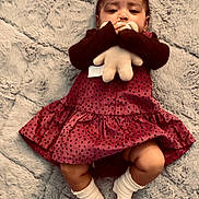 Ezra joined the competition — help win amazing prizes! baby, child, infant, portrait, lying_down, smiling, face, plush_toy, stuffed_animal, red_dress, polka_dots, socks, blanket, fuzzy_blanket, indoor, cozy, adorable, happy, fashion, photography