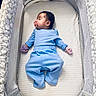 Ezra is registered to the contest to win money with this photo: baby, bassinet, blanket, blue_clothing, child, cozy, crib, cute, indoor, infant, mittens, newborn, pacifier, patterned, peaceful, portrait, resting, sleep, sleeping, soft_lighting