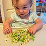Eden joined the competition — help win amazing prizes! toddler, child, high_chair, food, macaroni, broccoli, meal, eating, playful, cute, indoor, person, baby, clothing, table, hands, face, expression, smile, kitchen