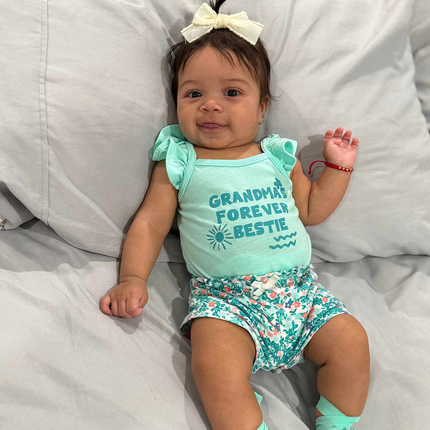 Adhara joined the competition — help win amazing prizes! baby, bed, bodypart, clothing, couch, cushion, face, finger, furniture, hand, happy, head, homedecor, person, photography, portrait, shorts, sitting, smile, t_shirt